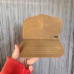 filson leather & canvas bill cap.